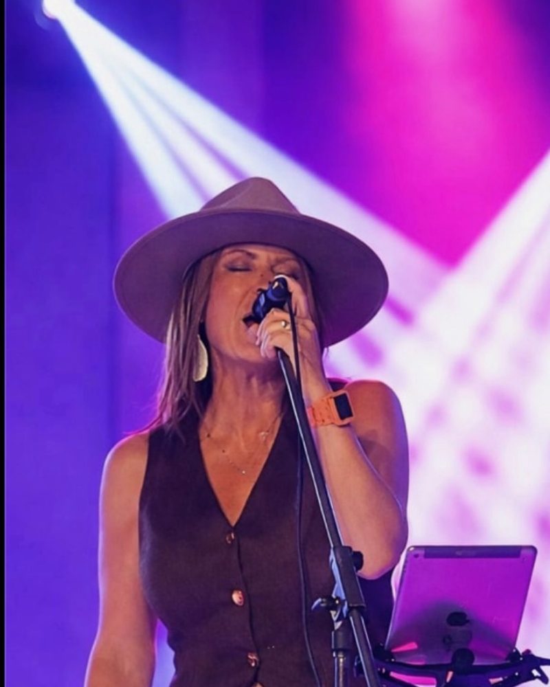 Kim Bryant singing on stage